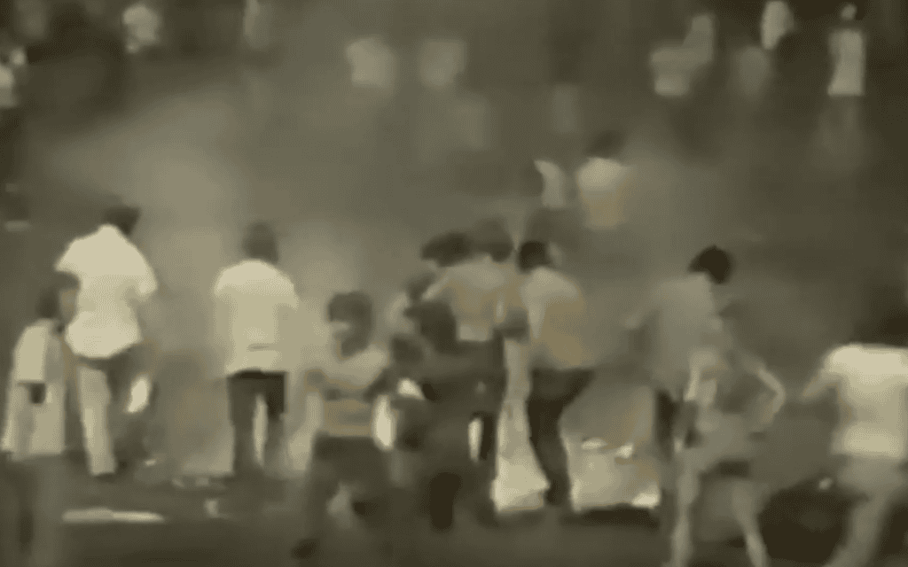 This image depicts the chaos of Disco Demolition Night, illustrating the bizarre moment in baseball history.